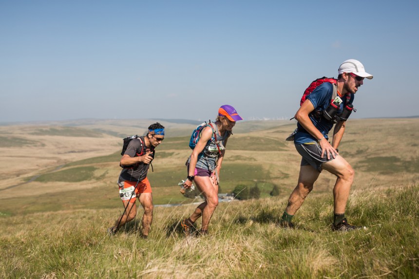 3 Caroline Mcllroy heads uphill with two other runners on day four of the Berghaus Dragon's Back Race - photo guillemcasanova.com